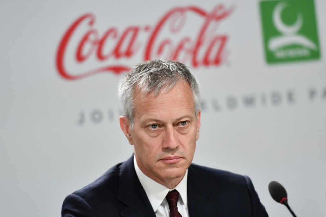Coca-Cola President and CEO James Quincey attends a press conference with International Olympic Committee (IOC) president and China Mengniu Dairy CEO and Executive Director,