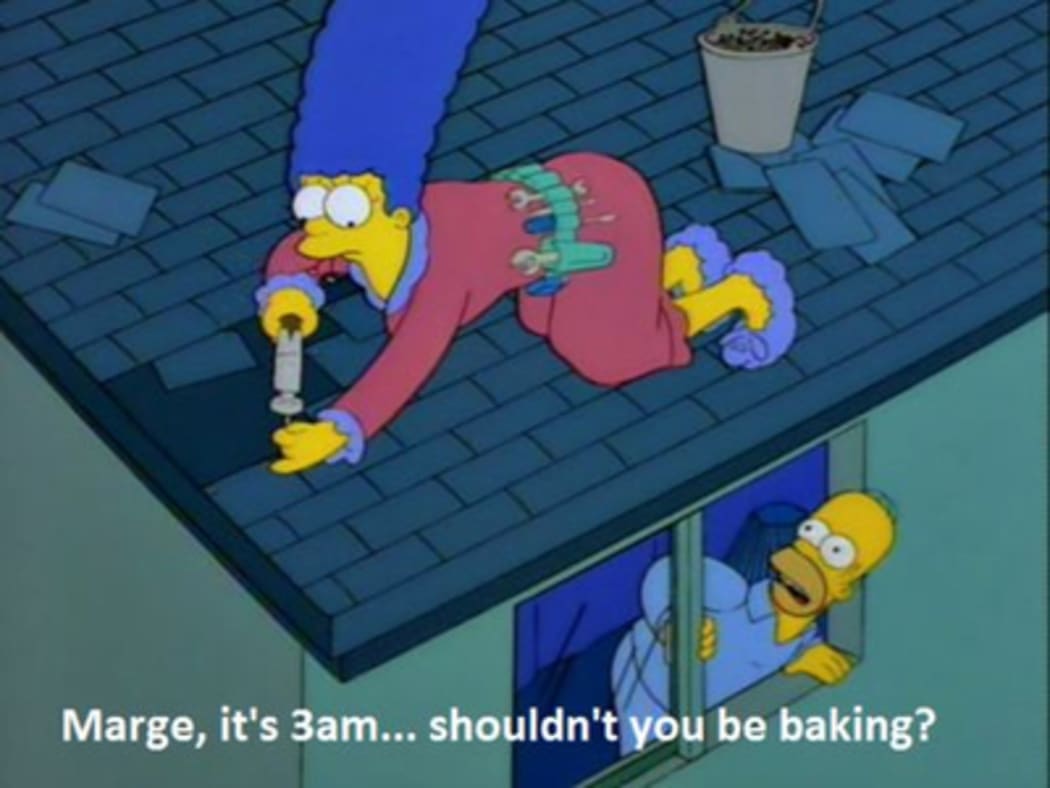 Marge Simpson, fixing roof tiles, at 3am, while Homer asks "it's 3am, shouldn't you be baking?"