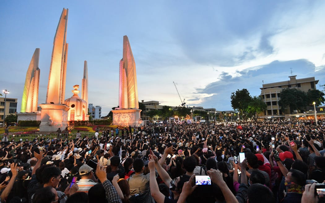 Anti-government protesters take part in a rally by the Democracy Monument in Bangkok on 16 August 2020.
