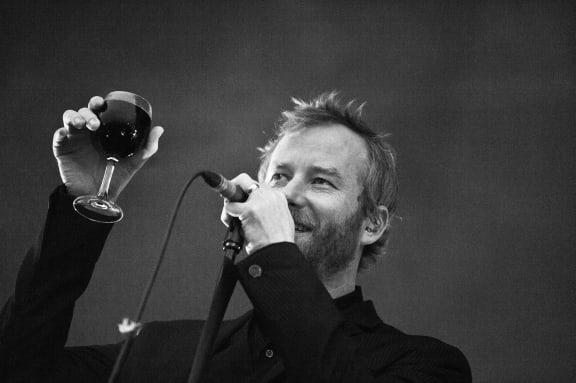 Matt Berninger drinking wine