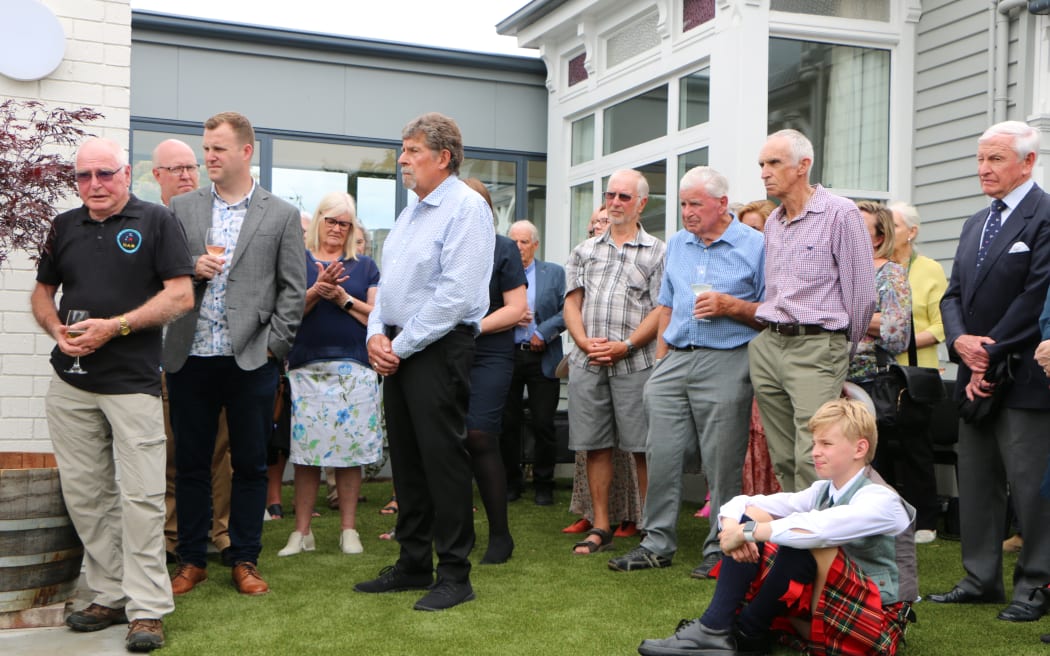 Hospital volunteers and guests gather in the hospital’s courtyard to celebrate the opening of the extension.