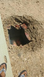 One of the damaged wells in the former detention centre.