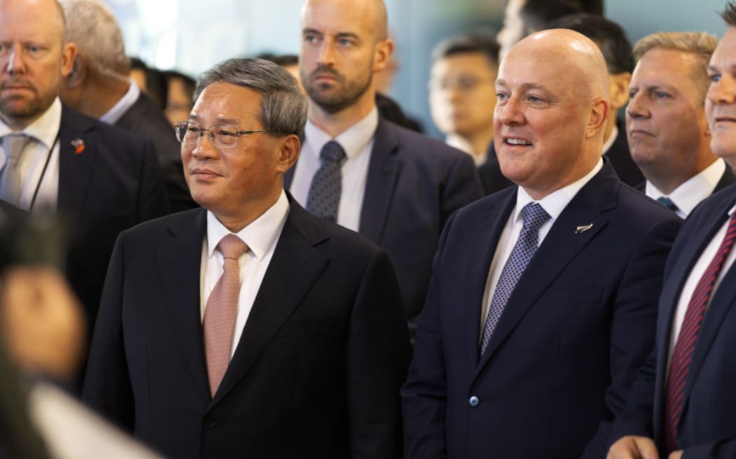 Chinese Premier Li Qiang and New Zealand Prime Minister Christopher Luxon showcasing New Zealand's agricultural innovation at an event at their headquarters in Auckland, 15th June, 2024.