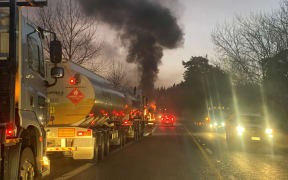 A vehicle on fire at Hūkerenui between Whangārei and Kawakawa.