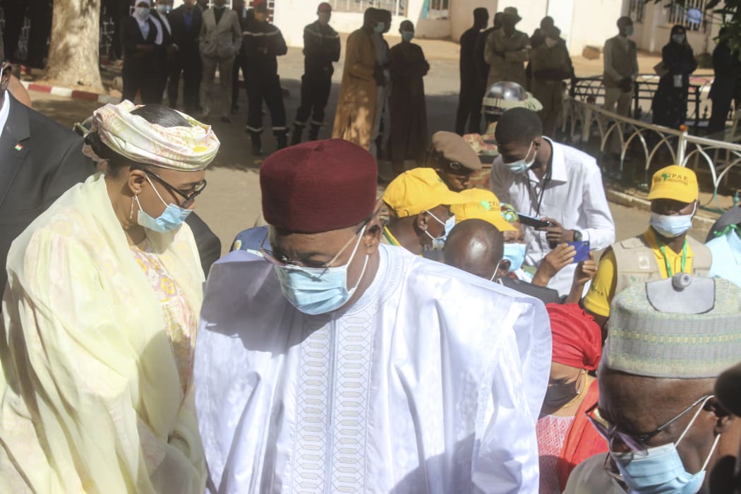 Nigerian presidential candidate Mohamed Bazoum arrives at a polling station in Niamey to cast his vote in the second round of Niger's presidential election, 21 February 2021.