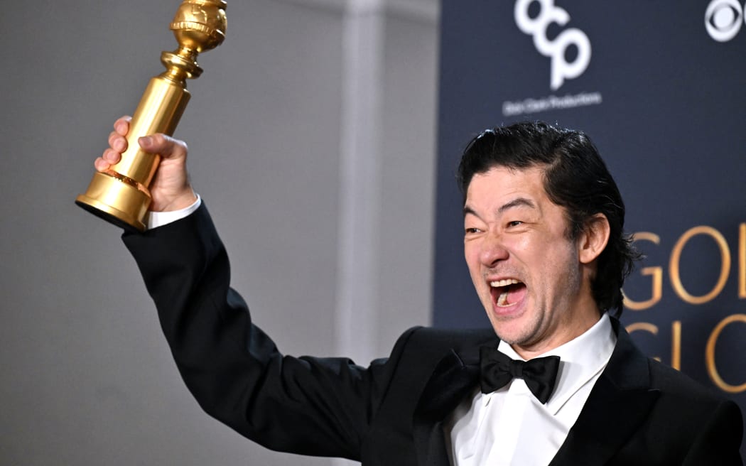 Japanese actor Tadanobu Asano poses with the Best Performance by a Male Actor in a Supporting Role on Television award for "Shogun" in the press room during the 82nd annual Golden Globe Awards at the Beverly Hilton hotel in Beverly Hills, California, on January 5, 2025.
