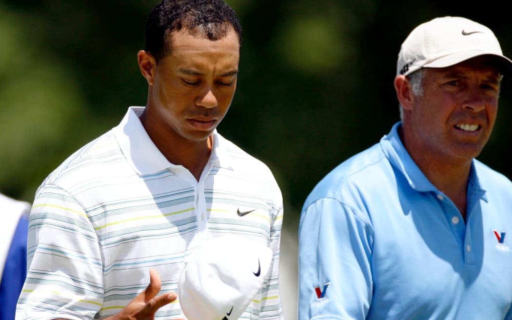 Tiger Woods and Steve Williams walk the fairways in 2006.
