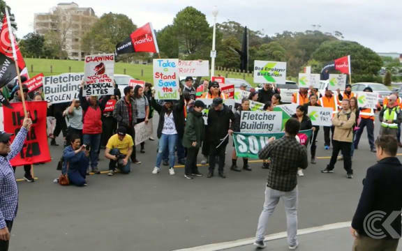 Protest outside Fletcher meeting as profit forecast slashed