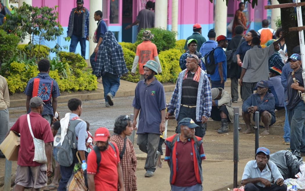 People going about their day in Goroka, Papua New Guinea