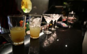Line up of drinks on bar