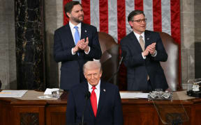 US President Donald Trump arrives to deliver his State of the Union address in the House Chamber of the US Capitol in Washington, DC, on February 24, 2026. (Photo by ANDREW CABALLERO-REYNOLDS / AFP)