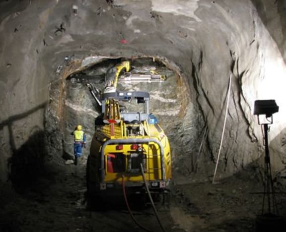 A photo from an August 2008 presentation shows construction work on the mine's tunnel before the explosion.