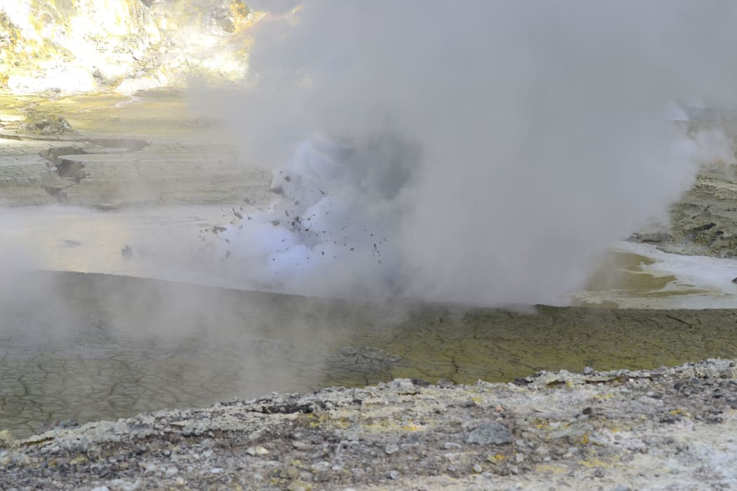 Rocks and mud have been thrown from the crater lake.