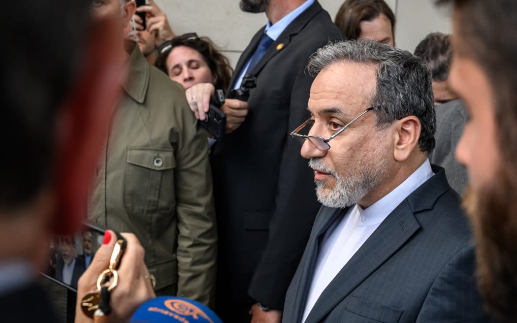 Iran's Foreign Minister Abbas Araghchi leaves after a meeting on Tehran's nuclear programme, with Germany's Foreign Minister, France's Minister for Europe and Foreign Affairs, European Union High Representative for Foreign Affairs and Security Policy and Britain's Foreign Secretary at the Intercontinental Hotel in Geneva on June 20, 2025, aside of a meeting of European Foreign Ministers, as European countries call for de-escalation of tensions after Israeli bombings aimed at breaking Iranian nuclear program. Top European diplomats are set to meet with Iran's Foreign Minister Abbas Araghchi in Geneva on June 20 to discuss Iran's nuclear programme. (Photo by Fabrice COFFRINI / AFP)