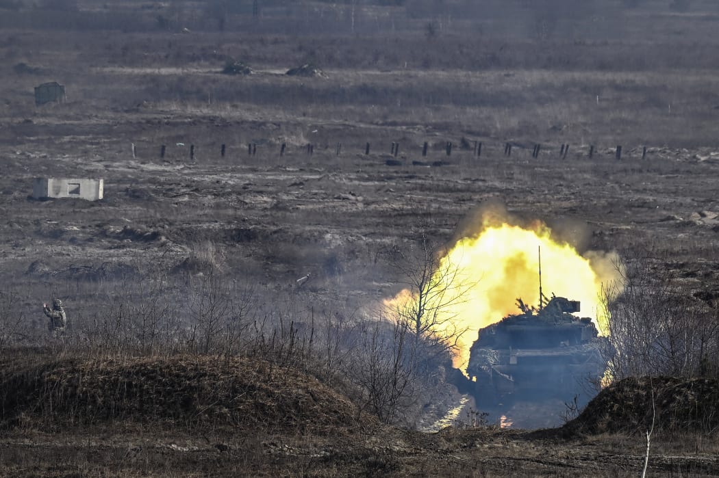 A Ukrainian Army T-64 tank firing during a military drill outside the city of Rivne, northern Ukraine, on February 16, 2022.