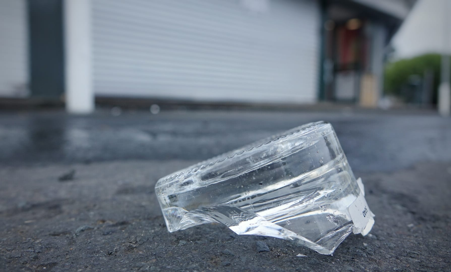 Broken glass outside the Sharland Avenue liquor store.