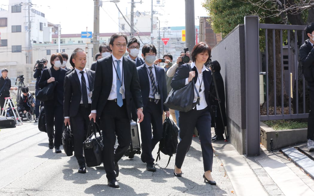 Japanese officials enter a Kobayashi Pharmaceutical factory to conduct an on-site inspection in Osaka City, on 30 March, 2024.
