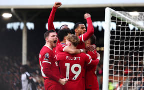 Liverpool players celebrate, 2024.