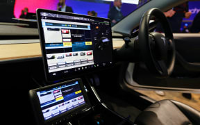 The inside of a Tesla Model S, equipped to work as a police car with vehicle registration plate fast reading and detection, exhibited during the Mobile World Congress 2023 on 11 March, 2023, in Barcelona, Spain.