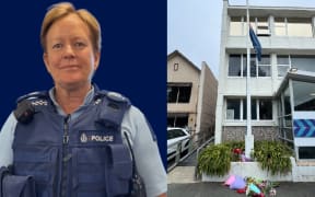 Senior Sergeant Lyn Fleming and some of the flowers laid outside her police station after her death.