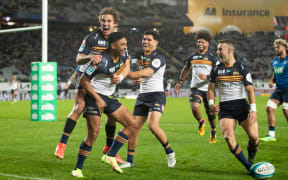 Brumbies 2nd-five Irae Simone celebrates his try.