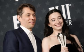 (From left) Sean Baker and Mikey Madison, winners of the the Best Picture award for "Anora," pose in the press room during the 30th Annual Critics Choice Awards at Barker Hangar on February 07, 2025 in Santa Monica, California.