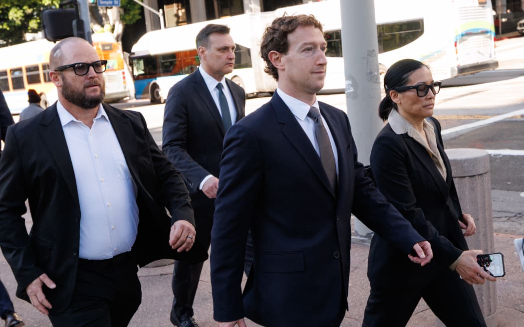 Meta CEO and Chairman Mark Zuckerberg arrives at Los Angeles Superior Court ahead of the social media trial tasked to determine whether social media giants deliberately designed their platforms to be addictive to children, in Los Angeles, on February 18, 2026. Zuckerberg is scheduled to testify Wednesday. (Photo by Patrick T. Fallon / AFP)