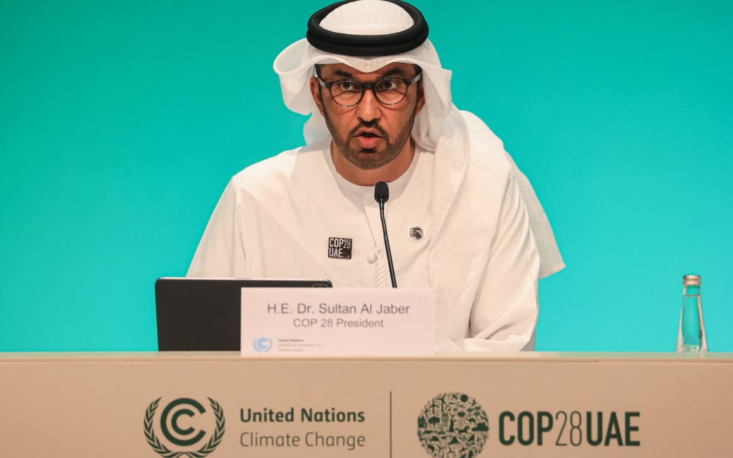 COP28 president Sultan Ahmed Al Jaber speaks during a press conference at the United Nations climate summit in Dubai on December 4, 2023. The Emirati president of the UN's COP28 talks said on December 4 he respects climate science, after a leaked video showed him declaring that no science says a fossil fuel phaseout will help achieve climate goals. (Photo by KARIM SAHIB / AFP)