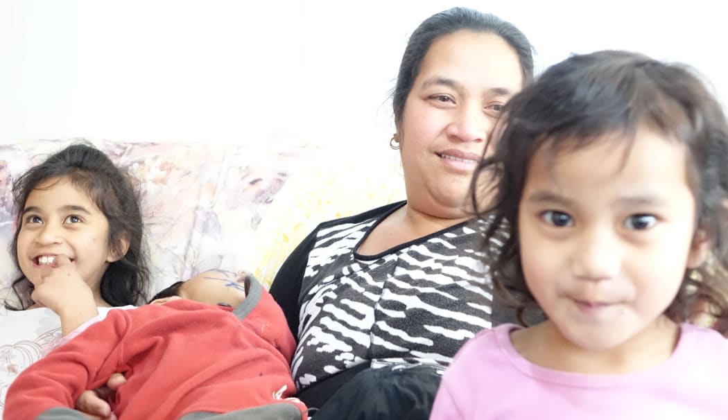 Angua Erika and her 3 children.