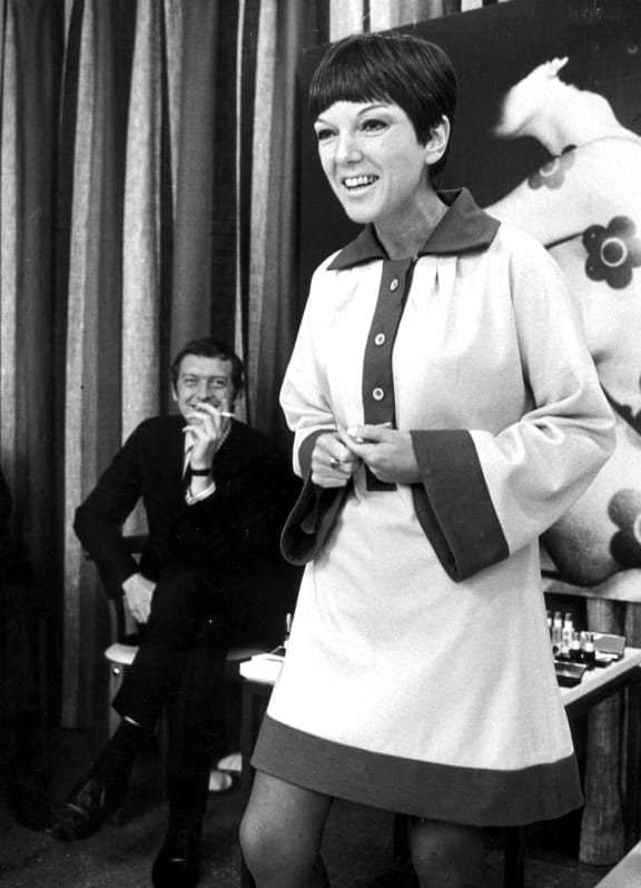 Fashion designer Mary Quant during a visit to Sweden August 18, 1966. In the background is her husband Alexander Plunket Greene.