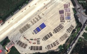 This handout satellite image courtesy of 2025 Maxar Technologies taken on August 31, 2025 and made available on September 2, 2025 shows an overview of the preparations underway at the Yangfang military base in Beijing, ahead of a military parade that marks the 80th anniversary of victory over Japan and the end of World War II. Thousands of troops will march in a huge military parade in China's capital on September 3, to commemorate the 80th anniversary of the defeat of Japan and the end of World War II. (Photo by Satellite image ©2025 Maxar Technologies / AFP) / RESTRICTED TO EDITORIAL USE - MANDATORY CREDIT "AFP PHOTO/ SATELLITE IMAGE ©2025 MAXAR TECHNOLOGIES" - NO MARKETING NO ADVERTISING CAMPAIGNS - DISTRIBUTED AS A SERVICE TO CLIENTS - THE WATERMARK MAY NOT BE REMOVED/CROPPED