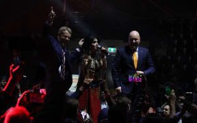 Prime Minister Christopher Luxon and opposition leader Chris Hipkins on stage during India's Independence Day celebrations in Auckland.