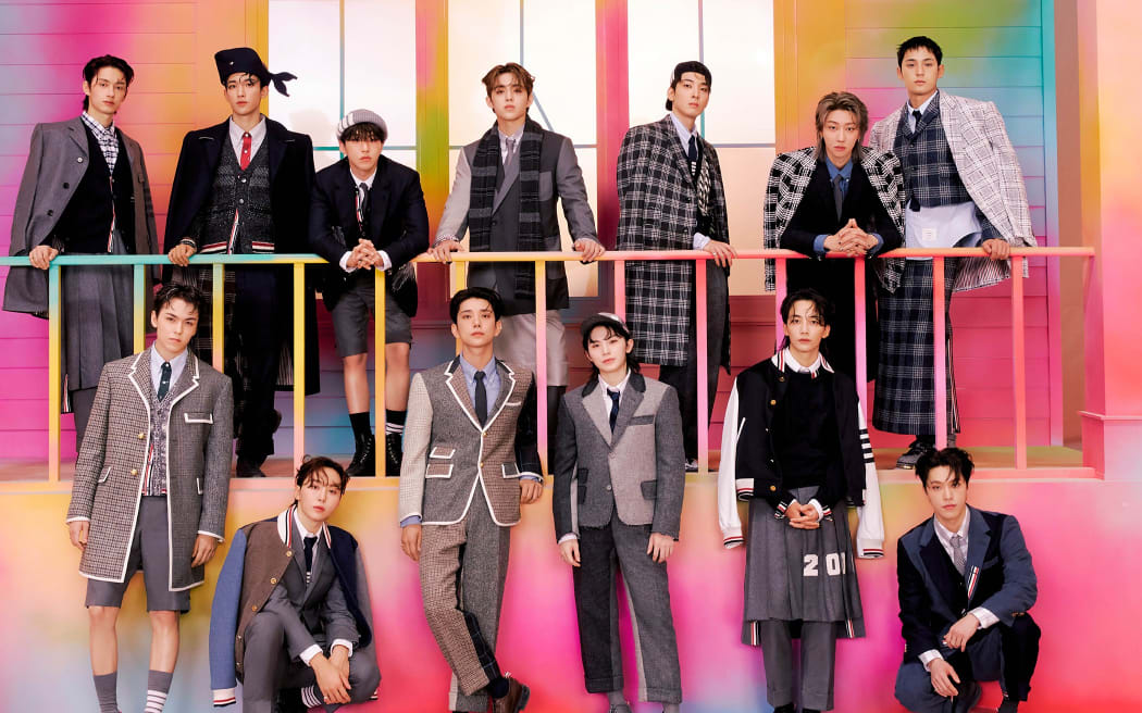 K-pop band Seventeen, with members S Coups, Jeonghan, Joshua, Jun, Hoshi, Wonwoo, Woozi, DK, Mingyu, The8, Seungkwan, Vernon and Dino.
