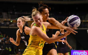 Karin Burger (right) and Kiera Austin of Australia tussle for possession in the fourth Constellation Cup test.