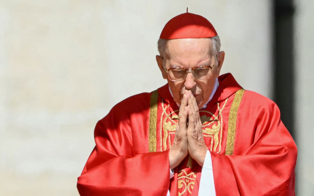 Italian cardinal Giovanni Battista Re officiates the mass in front of the coffin of late Pope Francis, during the funeral ceremony at St Peter's Square at the Vatican on April 26, 2025. (Photo by Alberto PIZZOLI / AFP)