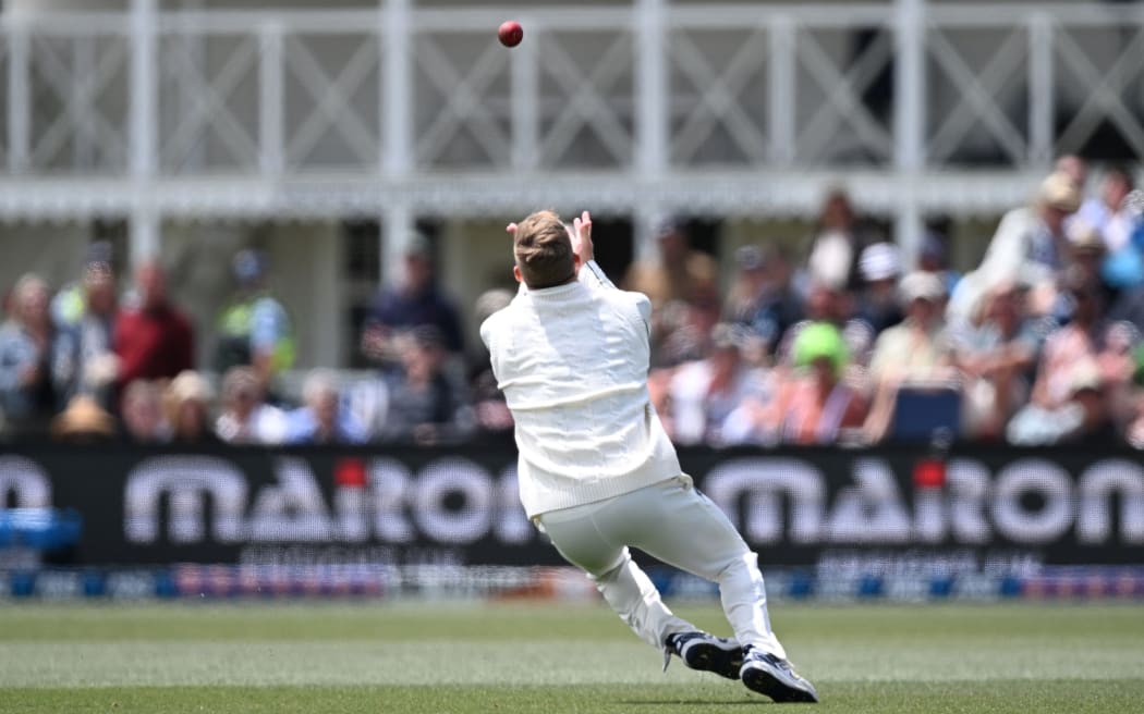 New Zealand's Glenn Philips drops a catch during first cricket test against England at Hagley Oval, 2024.