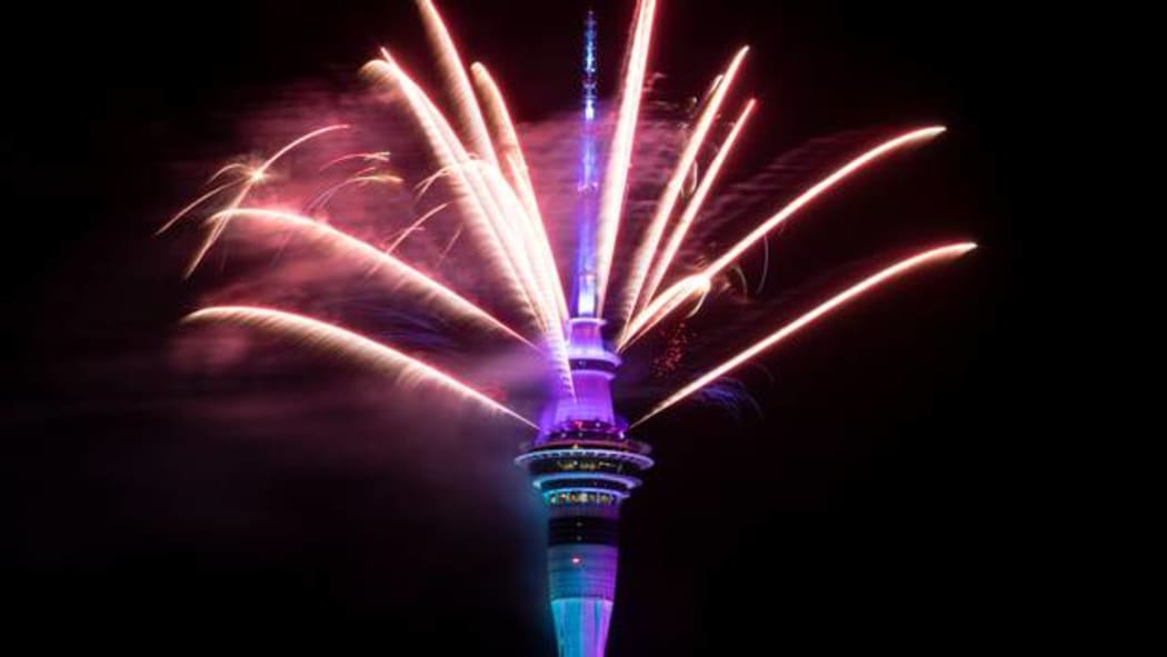 The Sky Tower lit up with an impressive fireworks display.