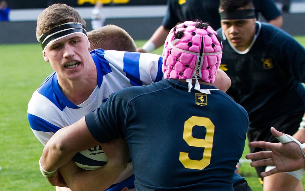 Dalton Papali`i is tackled during the Auckland secondary schools final in 2015, where he captained St Kentigern to victory over Auckland Grammar.