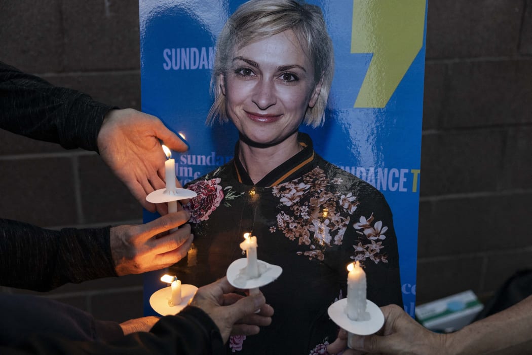 Locals and members of the local film community mourn the loss of cinematographer Halyna Hutchins, who died after being shot by Alec Baldwin on the set of his movie Rust at a vigil in Albuquerque, New Mexico, US.