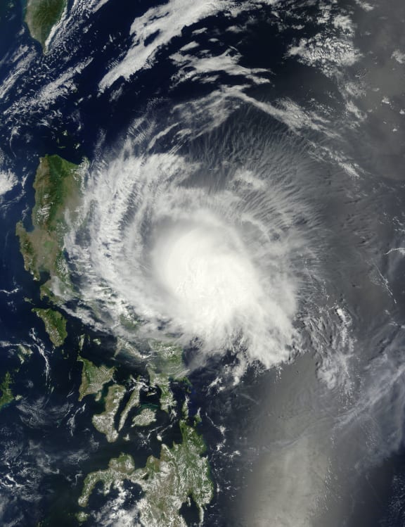 A NASA satellite image showing former Typhoon Maysak over the Philippines.