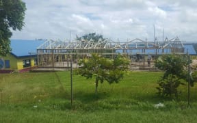 The tiny village of Eratap, south of Port Vila, was flattened in Cyclone Pam - the homes have now been rebuilt, but the school is still just wood framing.