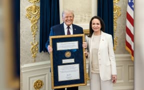 President Donald Trump meets with María Corina Machado in the Oval Office, where she presented him with her Nobel Peace Prize, on January 15.
Mandatory Credit:	White House via CNN Newsource