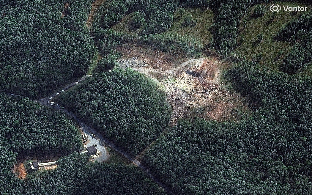 This handout satellite image released by Vantor on October 11, 2025, shows a view of the blast site following an explosion at Accurate Energetic Systems in McEwen, Humphreys County, Tennessee, on October 10, 2025. Nineteen people were missing and an unspecified number were killed after a massive blast tore through a US military explosives plant on October 10, prompting emergency responders to scour the ravaged site for any survivors, officials said. (Photo by Satellite image ©2025 Vantor / AFP) / RESTRICTED TO EDITORIAL USE - MANDATORY CREDIT "AFP PHOTO / SATELLITE IMAGE ©2025 VANTOR ” - NO MARKETING NO ADVERTISING CAMPAIGNS - DISTRIBUTED AS A SERVICE TO CLIENTS - THE WATERMARK MAY NOT BE REMOVED/CROPPED