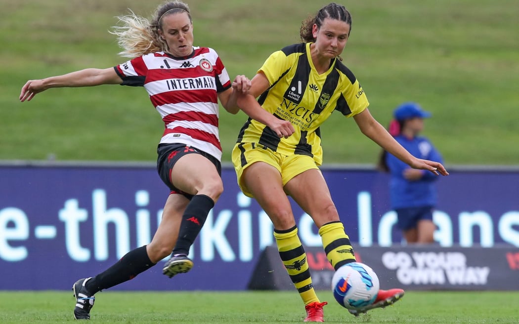 Zoe Mcmeeken of the Phoenix has a shot on goal during the A League Women's match