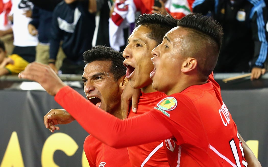 Raul Ruidiaz of Peru celebrates his controversial goal against Brazil with his team-mates at 2016 Copa America Centenario Group B match at Gillette Stadium on June 12, 2016 in Foxboro, Massachusetts. Tim Bradbury/Getty Images/AFP