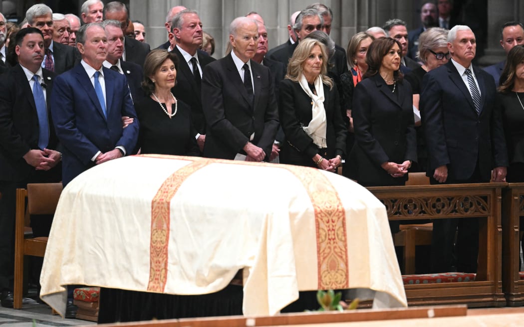 (L-R) Former US President George W. Bush his wife Laura Bush, Former US President Joe Biden, his wife Jill Biden, former US Vice President Kamala Harris, former US Vice President Mike Pence and his wife Karen Pence attend the funeral service for late US Vice President Dick Cheney at the Washington National Cathedral in Washington, DC, on November 20, 2025. Dick Cheney, celebrated as a master Republican strategist but defined by the darkest chapters of America's "War on Terror," was honored Thursday in a funeral attended by Washington's elite that pointedly left out President Donald Trump. (Photo by SAUL LOEB / AFP)