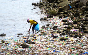 Port Moresby city cleanup effort in action on the city's waterfront.
