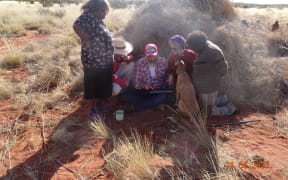 John Carty working with Aboriginal people