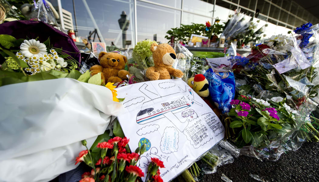 Flowers are being placed at Schiphol Airport near Amsterdam in memory of the victims of Malaysia Airlines flight MH17.