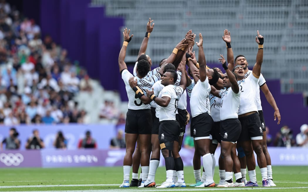 Fiji team huddle before the game against Uruguay on day one of the Paris 2024 Olympic Games at Stade de France on 24 July, 2024 in Paris. Photo credit: Mike Lee - KLC fotos for World Rugby